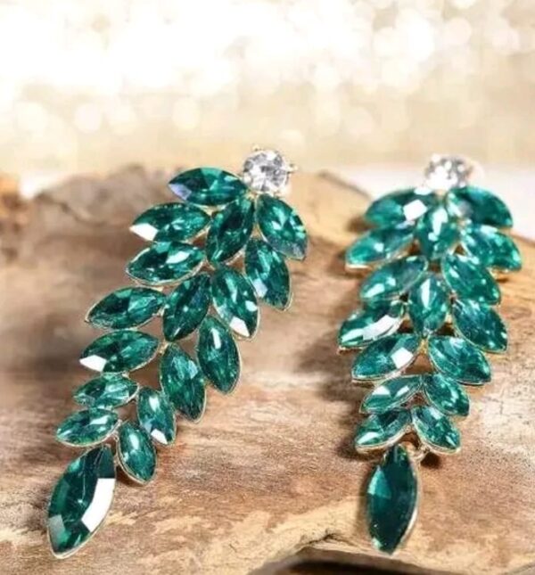 How about: "Emerald Elegance: Gold-Plated Chandelier Earrings with Green Crystal Stones