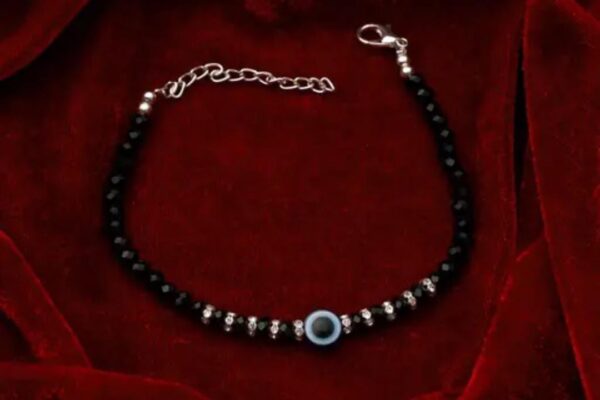 Mystic Charm: Black Evil Eye Bracelet with Silver Plating